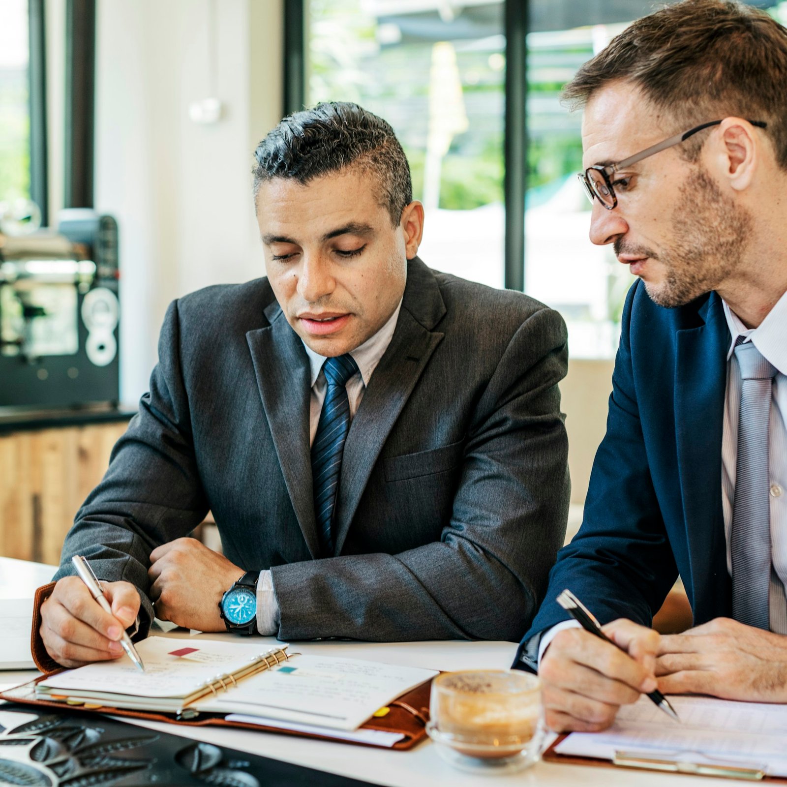 Two Businessmen Cafe Meeting Concept